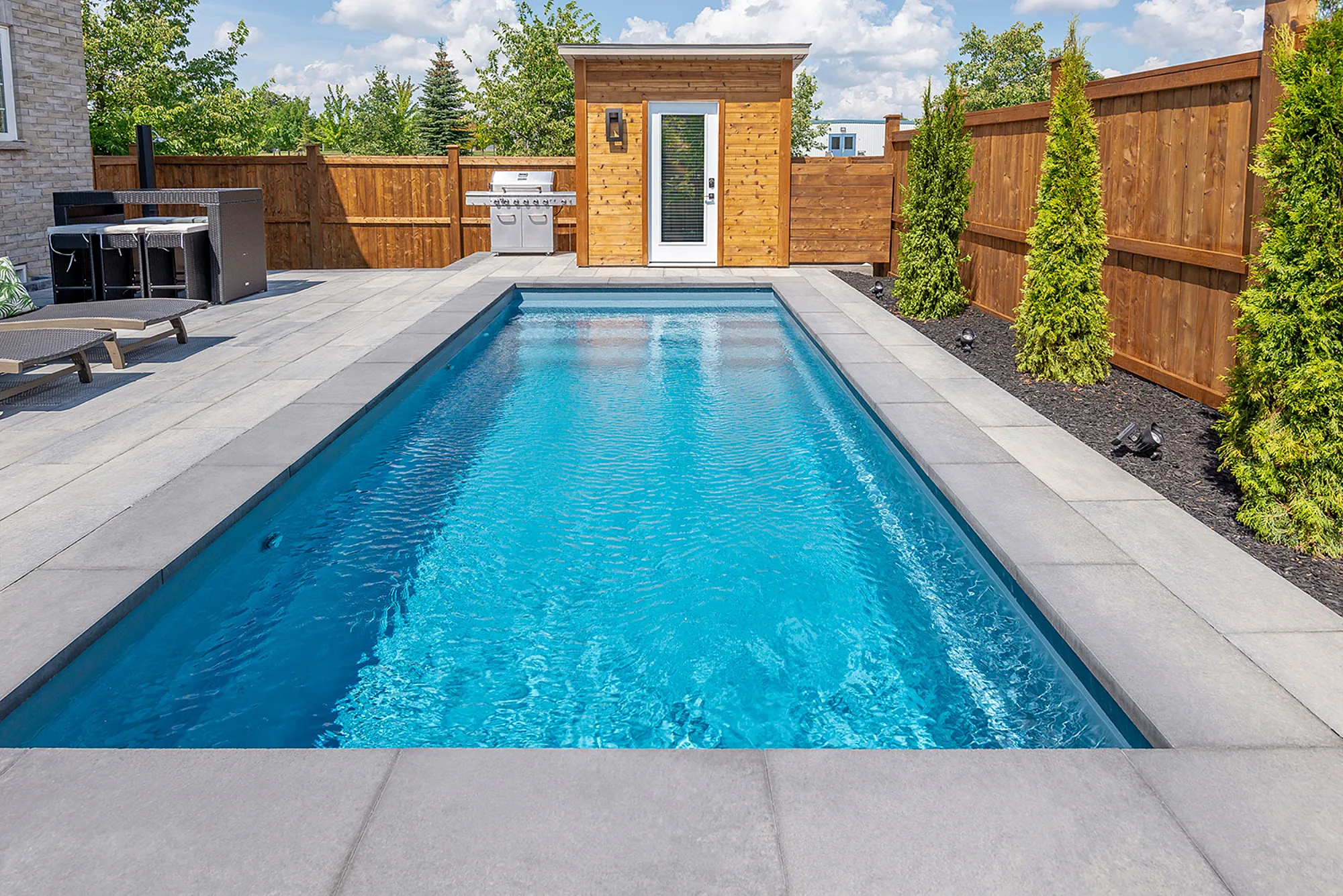 Azoria choosing between a fiberglass or concrete pool